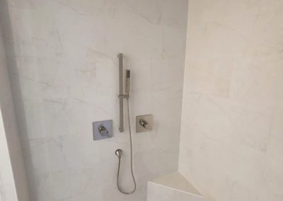 Shower faucets as part of Schluter Shower System