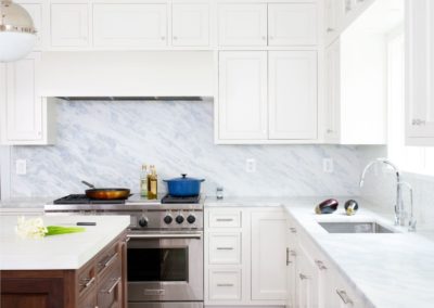 White marble countertop with white kitchen appliances